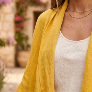 Poncho de lino de color mostaza para la temporada de verano Miomio