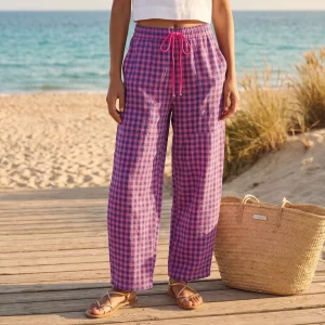 Pantalón de algodón y poliéster con estampado vichy en color morado y rosa Miomio